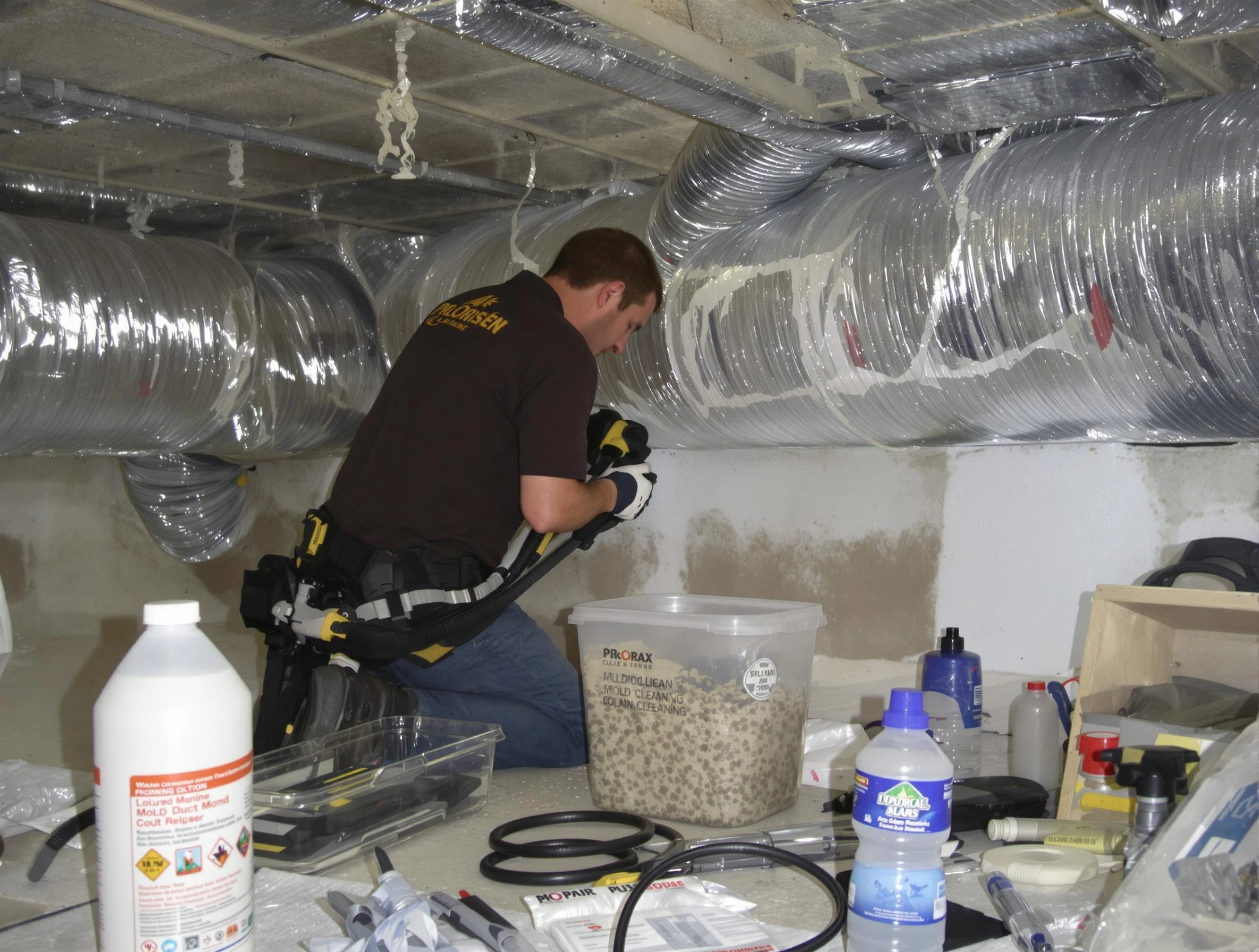 Beverly Air Duct Cleaning specialist performing professional mold removal from air ducts in Beverly